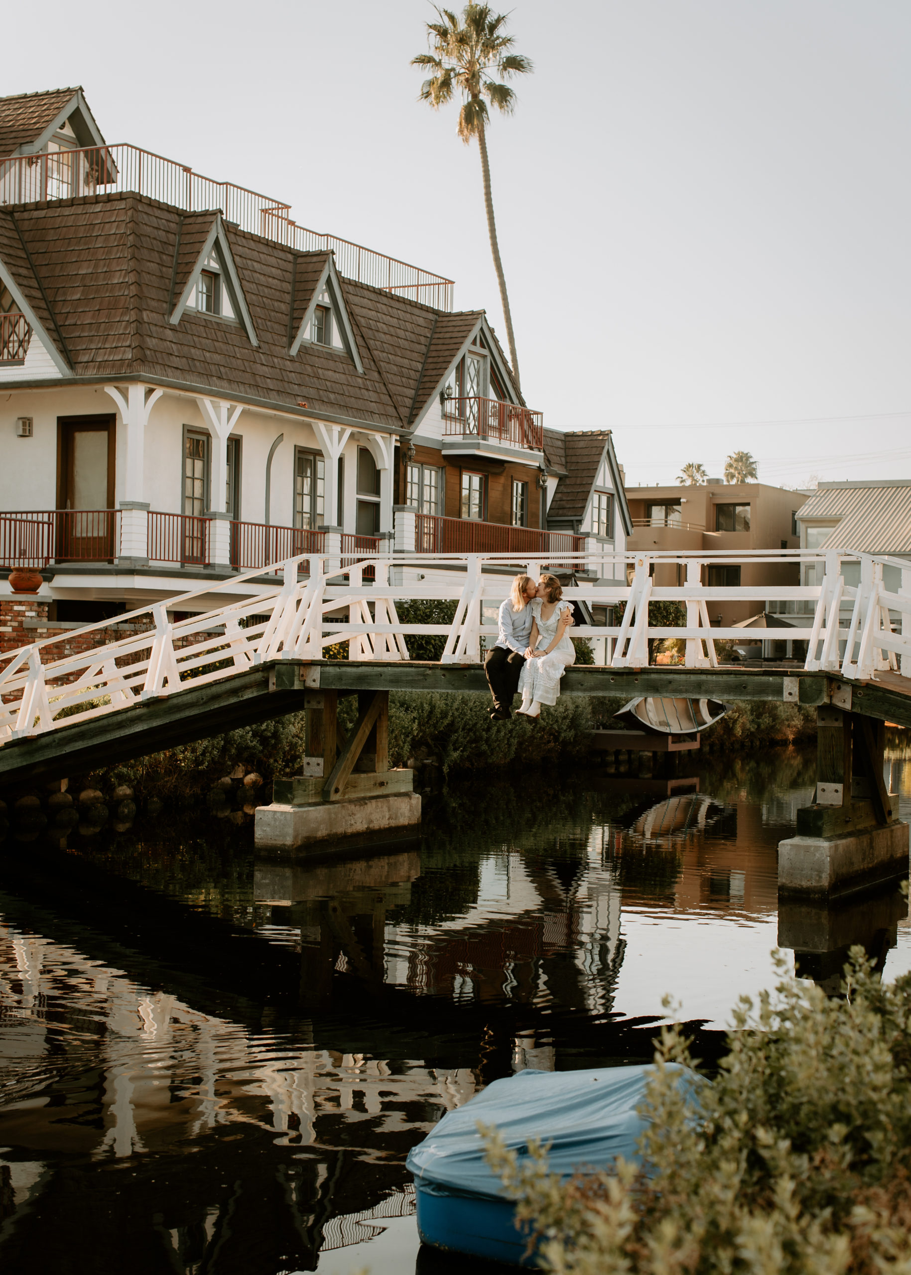 Venice Canals in Los Angeles engagement photos on bridge 